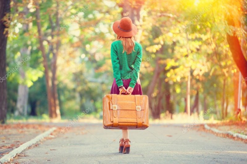 depositphotos_52391923-stock-photo-beautiful-redhead-girl-with-suitcase.jpg